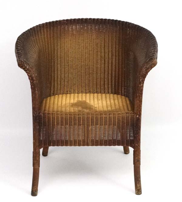W Lusty & Sons Ltd - A Lloyd Loom armchair. Labelled. - Image 2 of 7
