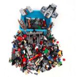 A large collection of Lego pieces, including spaceship , bike and an assortment of pieces .