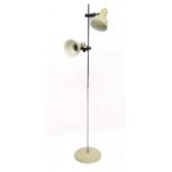 Vintage Retro : a Danish Standard lamp with twin multi directional lamps having buff finish and