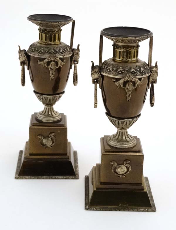 A pair of Egyptian Revival 19thC bronzed pedestal urns with loop handles. - Image 3 of 6