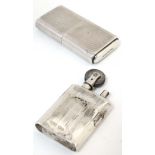 A silver cigarette lighter entitled 'The "Howitt" lighter with engine turned decoration.