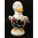 A Plichta pottery model of a duck , painted with clover on a white ground ,