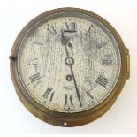 Ship's Clock : a brass cased timepiece marked Smith Empire with 5 3/4" dial and seconds dial at