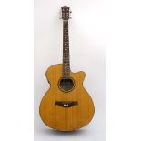 Musical Instruments : A late 20thC six string Electro - Acoustic Guitar by Godman ( model F561EQ/N