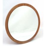 Vintage Retro : A Danish teak framed mirror of circular form, with hanger. 23 1/2" diameter.