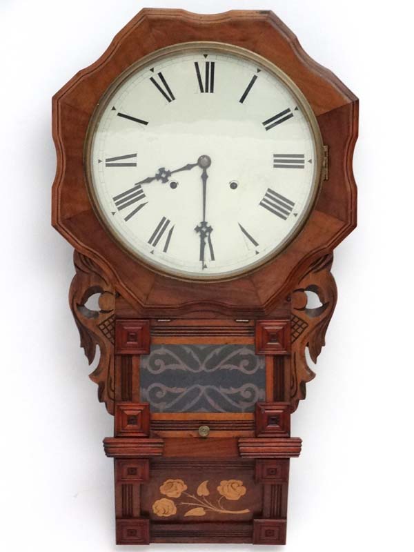 Clock : a 19thC 12" inlaid walnut cased 8 day wall clock with glazed and hinged aperture lower,