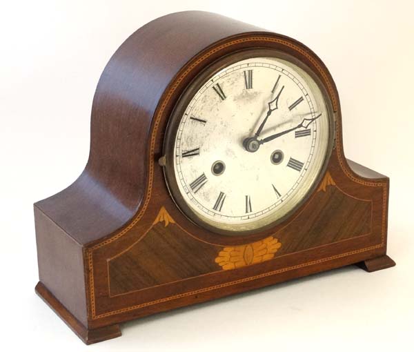 Harold 8 day Mahogany Mantel Clock :a signed inlaid case clock striking on a coiled gong,