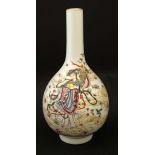 A Chinese famille rose bottle vase decorated in polychrome enamels with female figure amongst