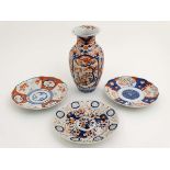 A collection of 3 Japanese Imari plates, one having reticulated rim,