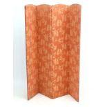 An upholstered 4-fold screen with decorated silk upholstery standing 66" high x 44" long (extended)