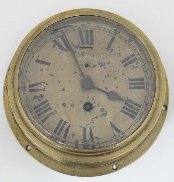 Clock : a brass cased ship's / submarine 6 5/8" wall timepiece Clock With fast- slow at 12 and - Image 4 of 4