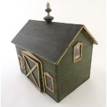 An c1900 Child's wooden green and cream painted toy Stable block / barn with two internal stalls
