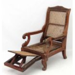 A 19thC Colonial Rosewood and bergere planters chair with adjustable rake back,