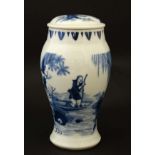 A Chinese blue and white pot and cover decorated with a figure in a boat on a lake amongst a rocky