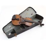 Musical Instruments : A cased 19thC Italian Violin ,