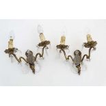Light : A pair of 2 branch brass wall lights each with glass drop decoration ,