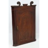 A Regency mahogany hanging corner cupboard 41 1/2" high CONDITION: Please Note -