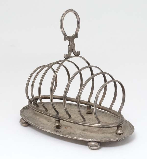A large 7 bar toast rack with oval stand 8" wide x 7 1/2" high CONDITION: Please - Image 2 of 4