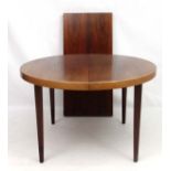 Vintage Retro : a Danish extending Rosewood table designed by Kai Kristianson (1929) ,