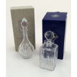 Edinburgh Crystal: 2 cut crystal decanters and stoppers. The largest 12" high ( boxed) .
