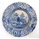 A small 19thC blue and white '' Cow and calf '' pattern plate. 7'' diameter.