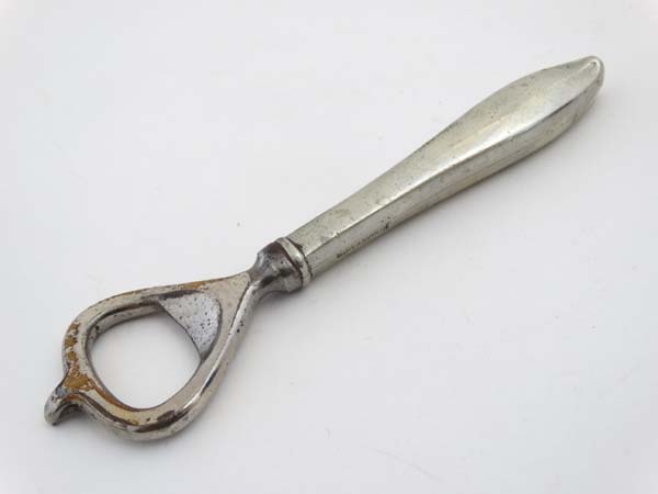 Bottle Opener : a nickel plated early 20 thC bottle opener with foil hook,