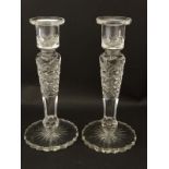 A pair of cut glass candlesticks 8 1/2" high CONDITION: Please Note - we do not
