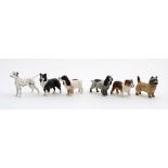 A collection of 6 small Beswick models formed as dogs ,