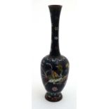 A late 19thC Chinese Cloisonne long necked bottle vase with fire bird decoration and butterflies