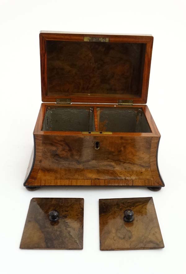 A Victorian burr walnut cross banded concave 2 division tea caddy on squat bun feet. - Image 8 of 9