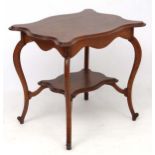 A late 19thC Serpentine shaped 2-tier oak occasional table 28 1/4" high x 30 1/2" wide x 23" deep