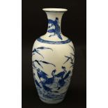 A Chinese blue and white vase with flared rim decorated with ducks amongst reeds,