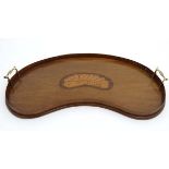 An Edwardian Sheraton revival kidney shaped 2-handled tray with brass handles and shell inlay 26"
