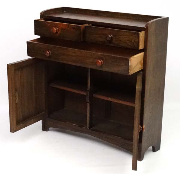 Heal & Son: An oak side cabinet of 2 short. - Image 4 of 6