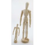 An Artists wooden lay figure / mannequin together with a smaller version.