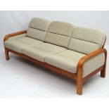 Vintage Retro : a Danish Suite comprising of a blonde wood surround to a 3 seat sofa and 2