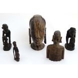 Ethnographica : A quantity of Native Tribal African figures , to include : a head figure smoking,