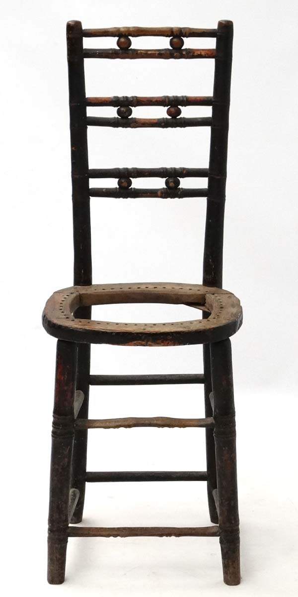 A 19thC ebonised faux bamboo Mendlesham correctional chair 35" high CONDITION: - Image 4 of 4