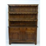 A late 19thC oak Continental dresser 63" wide x 84" high x 8 1/2" deep CONDITION: