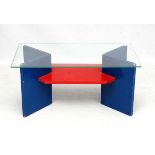 Vintage Retro :A follower of Ettote Sottsass a plate glass topped red and blue coffee table.