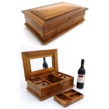 A French blonde walnut jewelry box with fitted interior and internal mirror,