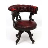 A 19thC button back leather desk chair with swivel seat 32" high CONDITION: Please