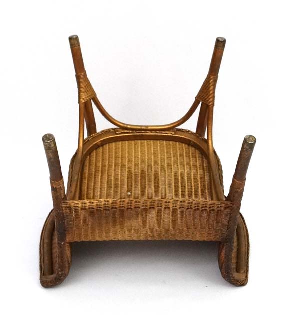 W Lusty & Sons Ltd - A Lloyd Loom armchair. Labelled. - Image 5 of 7