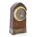 Arts and Crafts : a crossed arrows (HAC ) brass and oak alarm clock striking on a bell with sprung