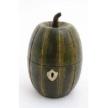 A 21stC hand painted novelty American style tea caddy in the form of a melon. 6 1/4'' high.