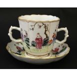 An Oriental famille rose two handled mug and saucer ,