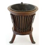 Edwardian mahogany jardiniere with ribbed sides on triform base CONDITION: Please