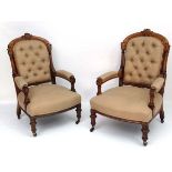 Two North Country button back open armchairs with oak frames and upholstered arm rests etc.