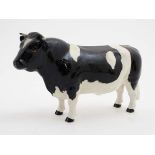 A Beswick model formed as a Friesian Bull '' Champion Coddington Hilt Bar '',