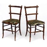 A pair of Victorian faux rosewood boudoir chairs with upholstered seats 32" high